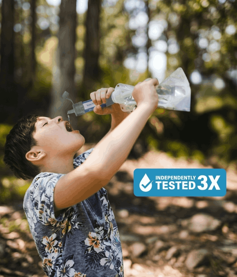 Child drinking filter water by Survival Sip